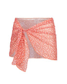 The front of the Arya sarong in floral peach on a white background.