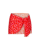 The front of the Arya sarong in floral red on a white background.