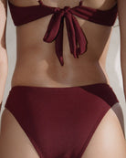 Close-up of the back of the Marina Brazilian bottom in burgundy rib.